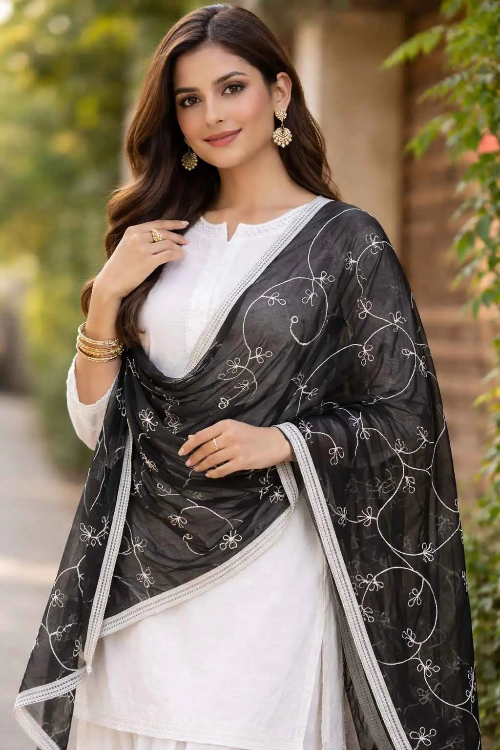Black embroidered sheer dupatta by Marjeena featuring intricate embroidery and lightweight, elegant ethnic accessory design.