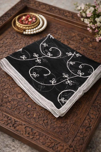 Marjeena black embroidered sheer dupatta with intricate embroidery, lightweight ethnic accessory, draped fabric with detailed craftsmanship.