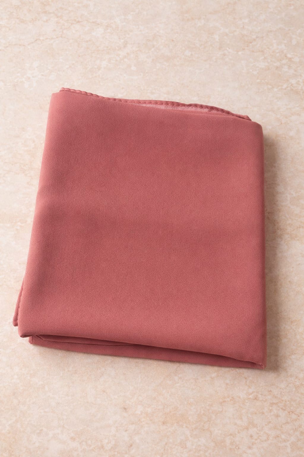 Marjeena blush pink premium jersey hijab, lightweight and soft scarf with elegant drape, styled for modest fashion.