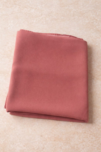 Marjeena blush pink premium jersey hijab, lightweight and soft scarf with elegant drape, styled for modest fashion.
