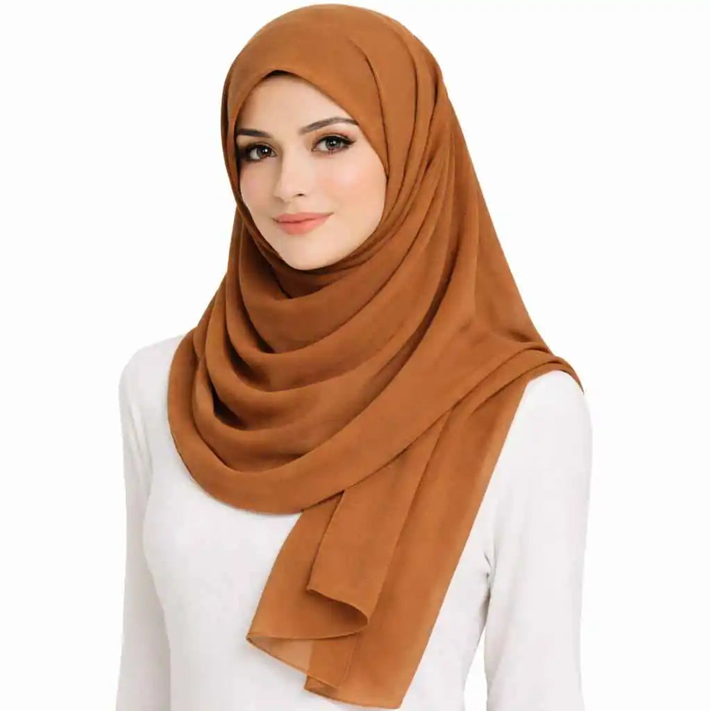 Marjeena caramel premium jersey hijab worn by a woman, showcasing soft, lightweight fabric and stylish drape.
