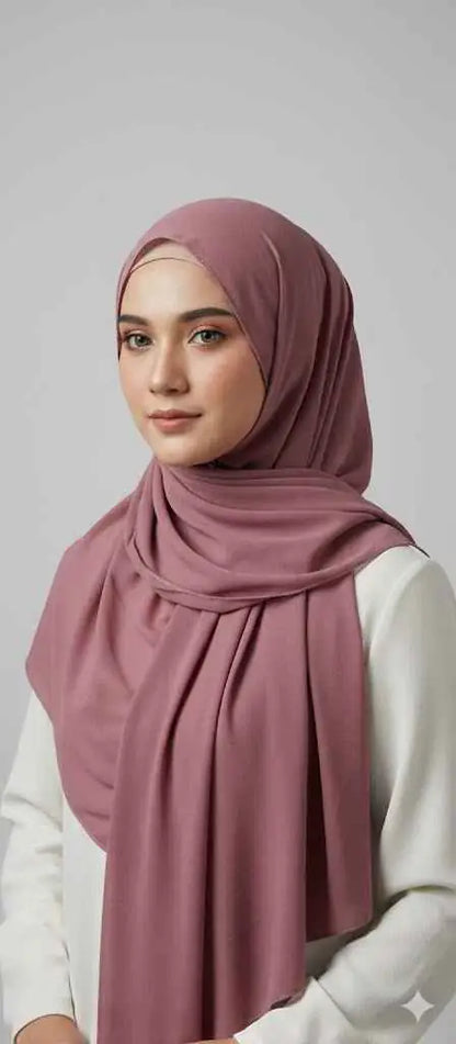 Marjeena Dusty Rose premium jersey hijab featuring soft, comfortable fabric and elegant drape, perfect for everyday wear.