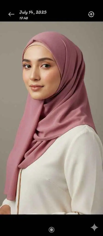 Marjeena Dusty Rose Premium Jersey Hijab draped stylishly, showcasing soft fabric and elegant color for modest fashion.