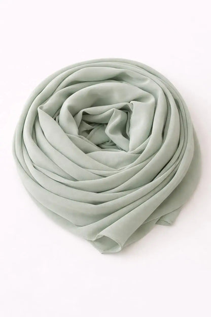 Light grey Marjeena premium jersey hijab displayed flat, showing soft, smooth fabric and elegant drape.