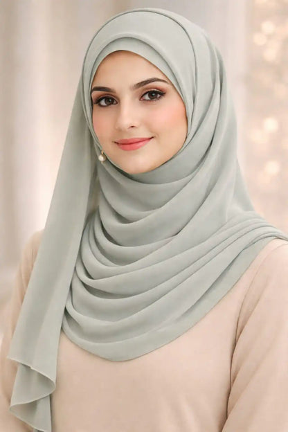 Light grey Marjeena premium jersey hijab draped neatly, showcasing soft, breathable fabric and elegant style.