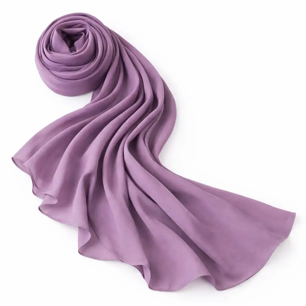 Marjeena Lilac Premium Jersey Hijab, soft and lightweight scarf made of comfortable jersey fabric, styled in a flowing drape.